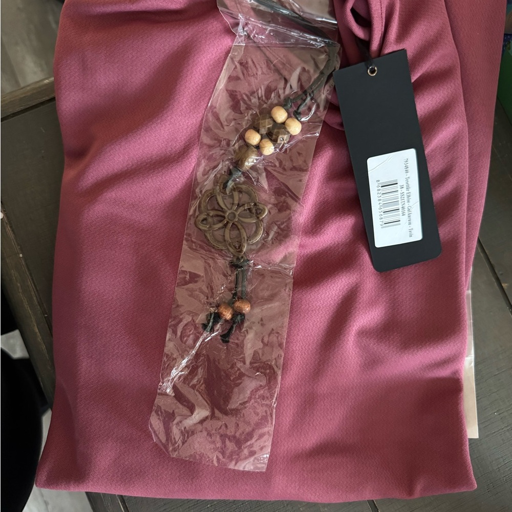 Pink Fabric with Decorative Beaded Accent